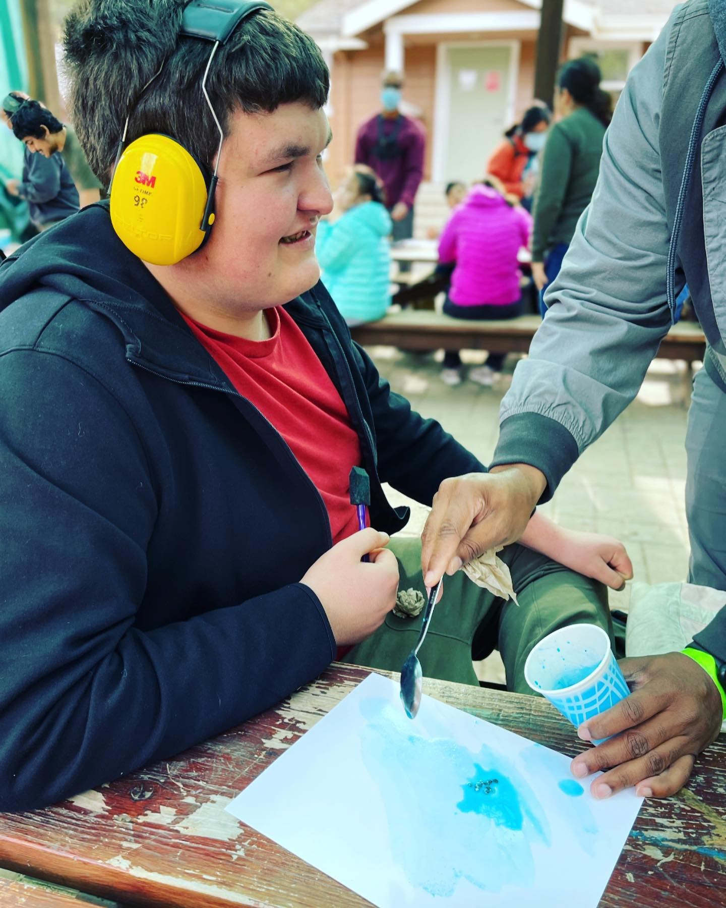 Creekside School sign in front of the campus building
