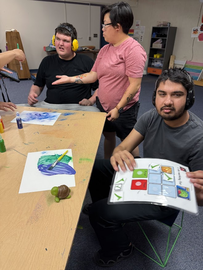 Students and staff at Creekside engaging in a learning activity.