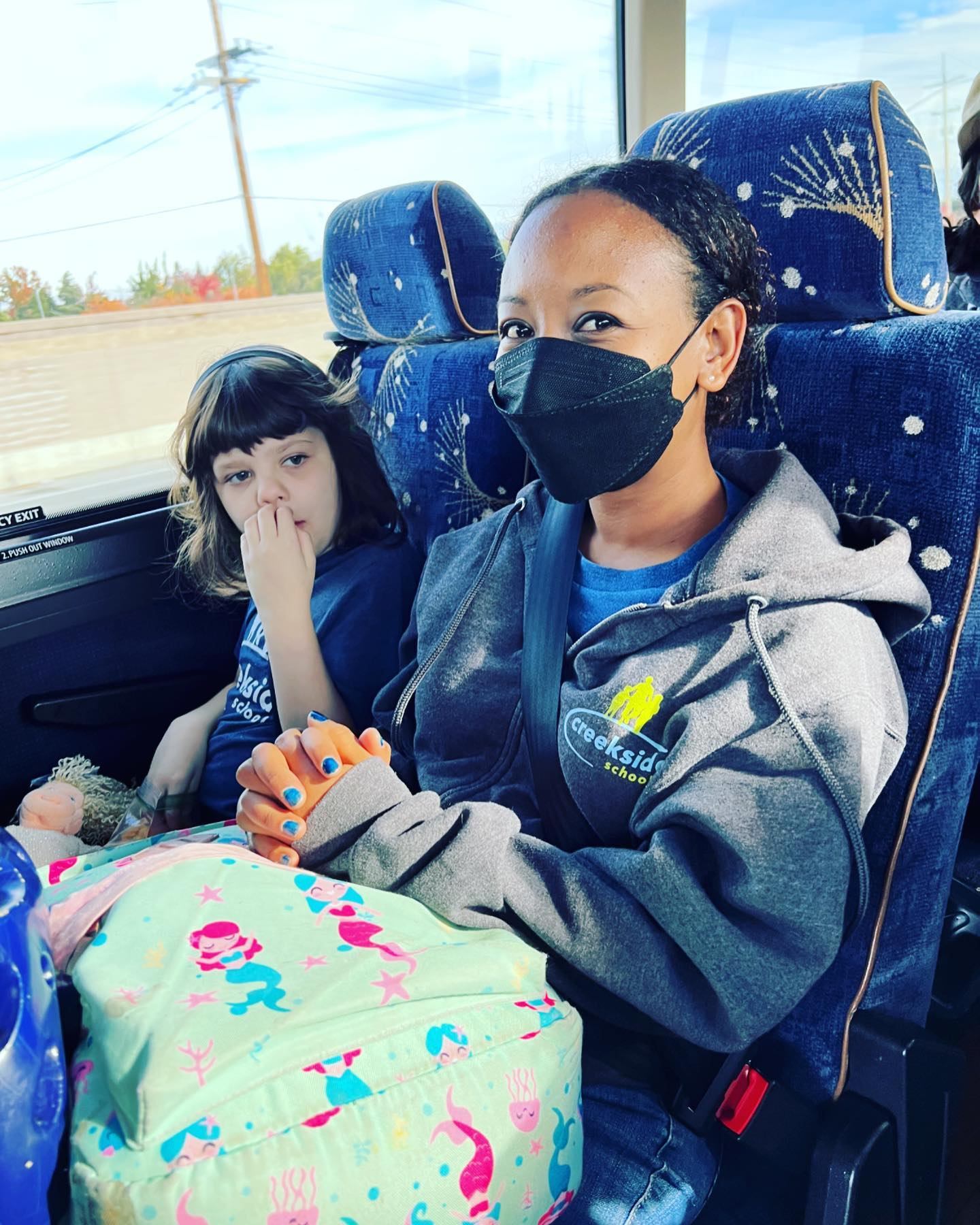 Students and staff at Creekside engaging in a learning activity.