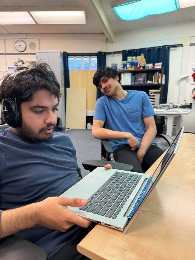 Students and staff at Creekside engaging in a learning activity.