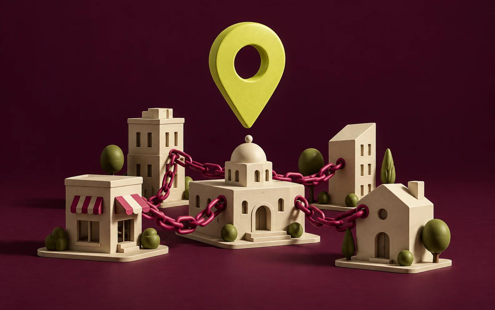 A yellow location pin above a cream town connected with rose chain links.