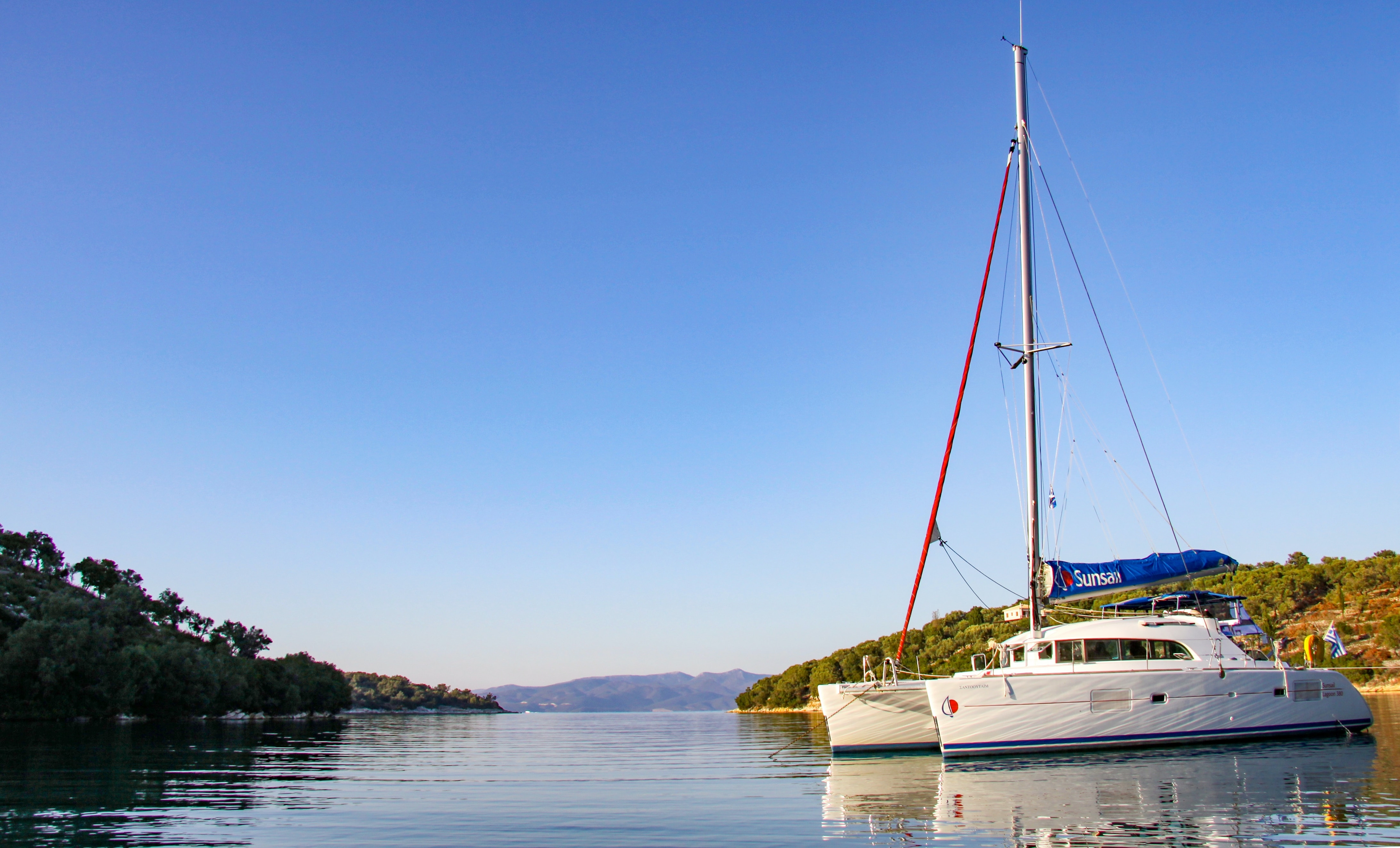 Catamaran anchored in a beatiful bay