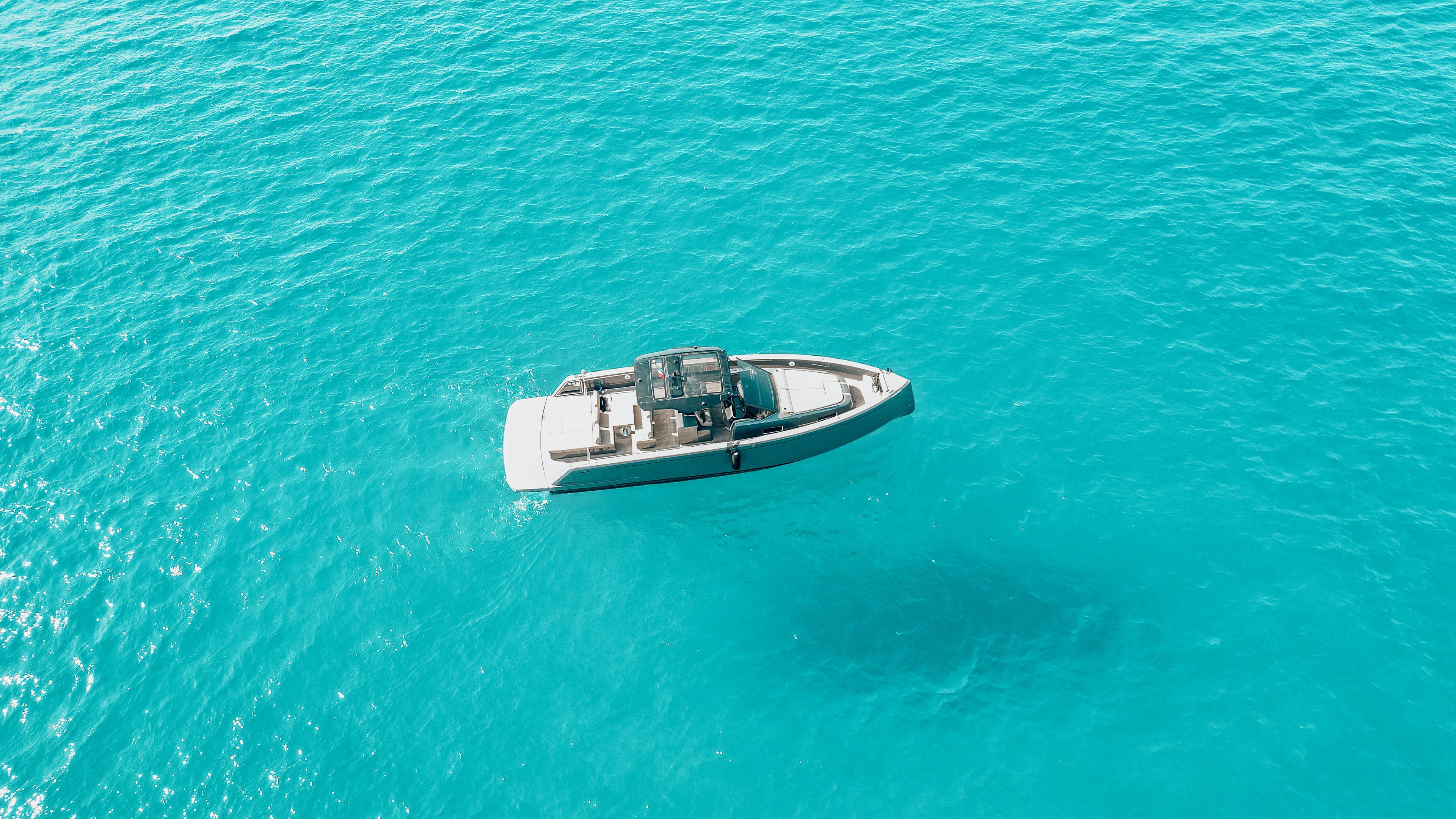 Anchored motor yacht on a beautiful blue water