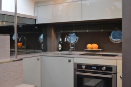 Fully equipped kitchen with oven, microwave, induction, sink and lots of storage space.