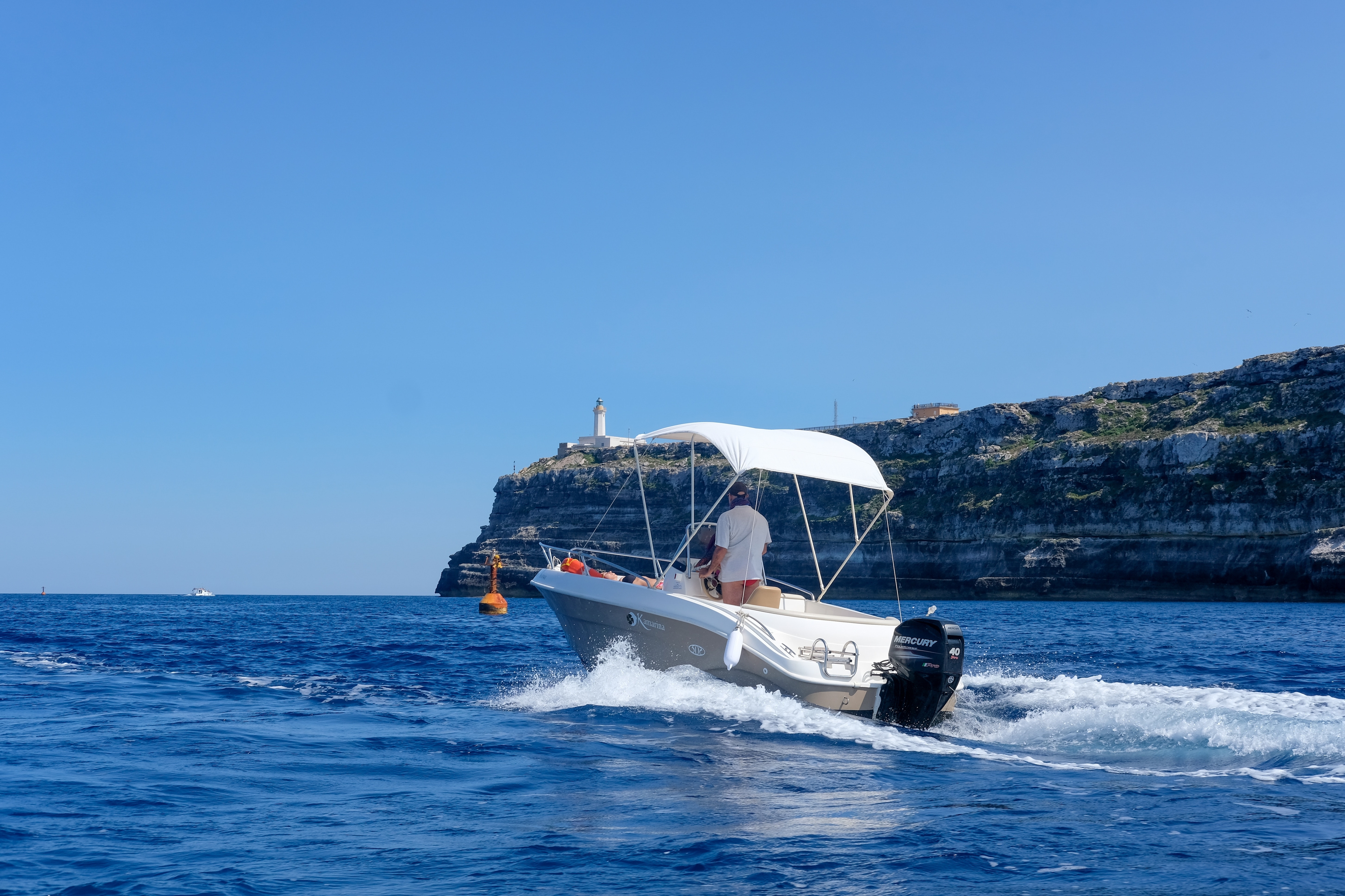 Motor boat cruising on the calm sea waters