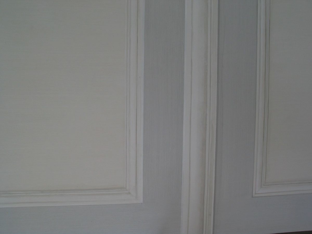 Trompe l'oeil — malowana iluzja optyczna sztukaterii na ścianie