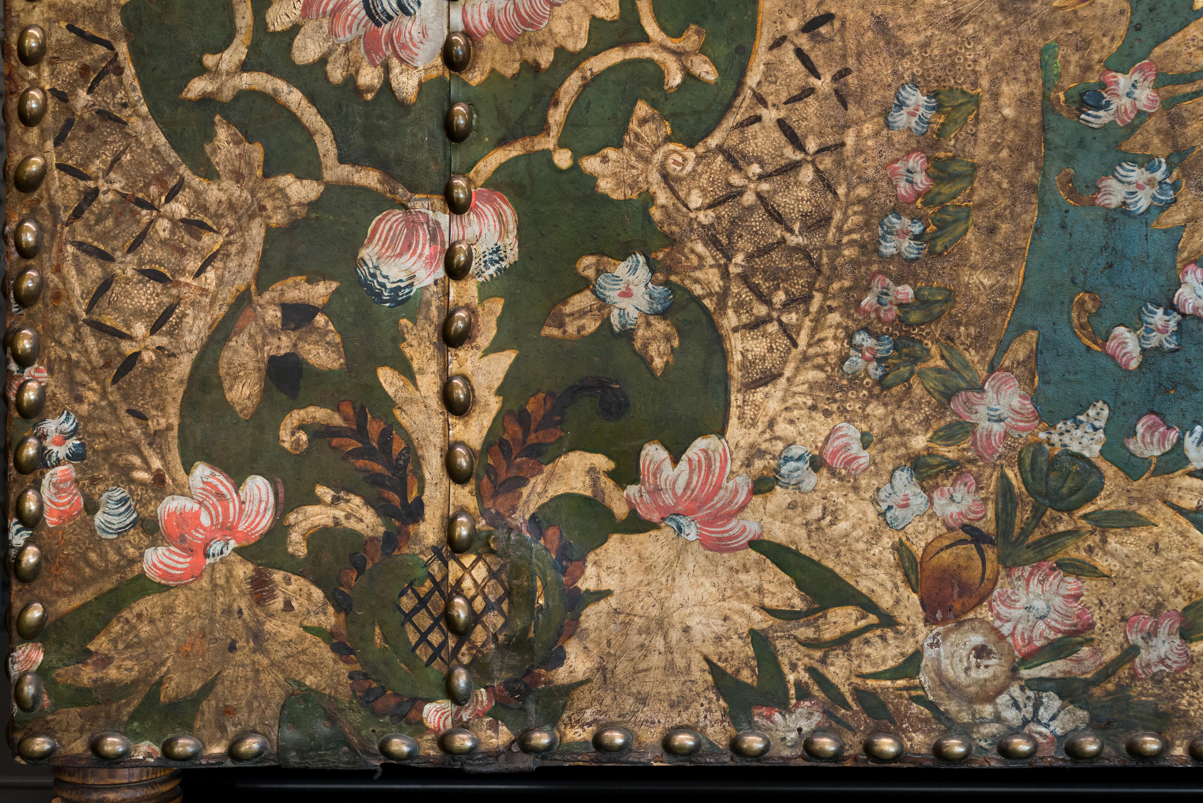 Details from an ornamented piece of wallpaper.