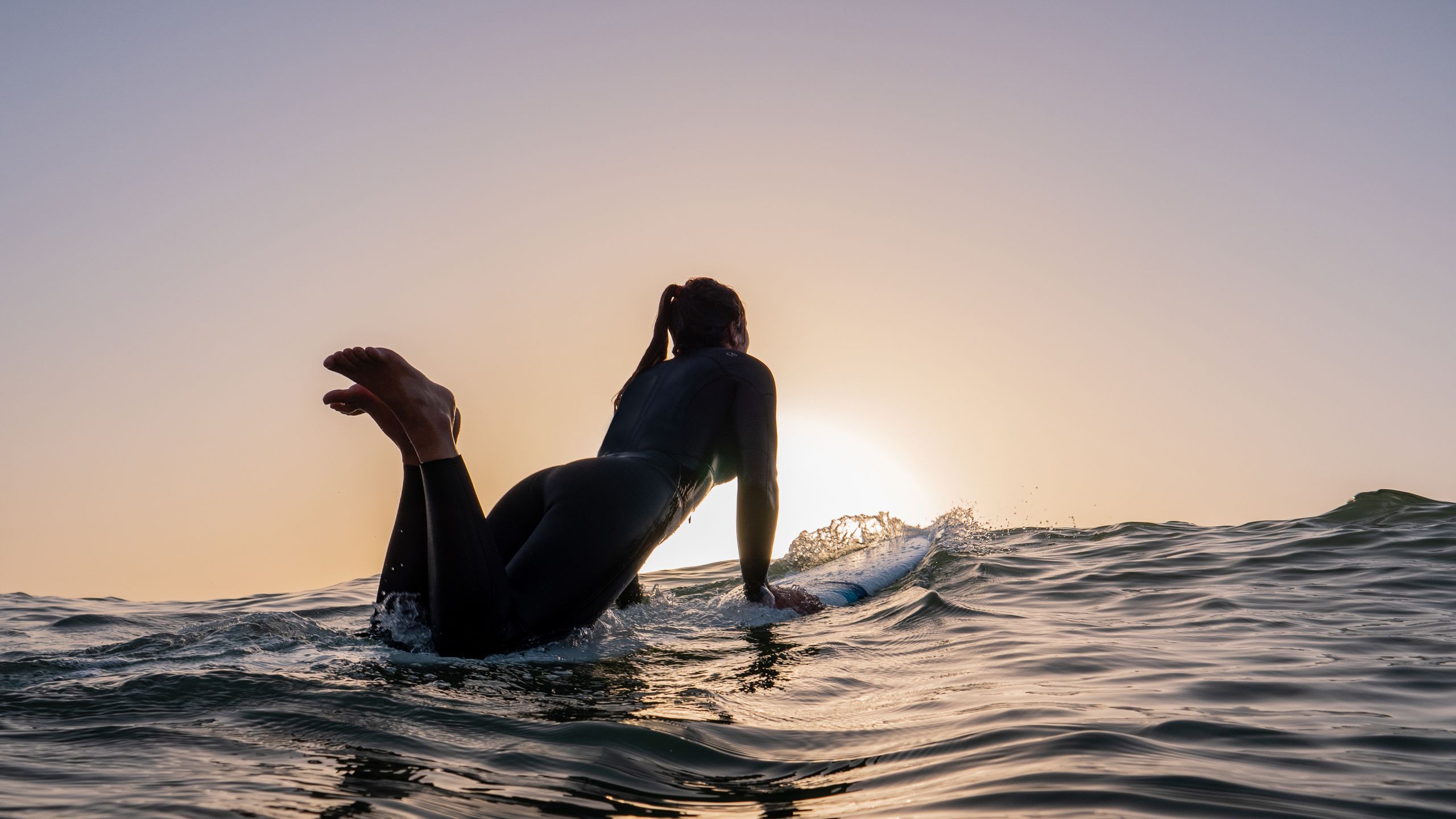Olaian Loobook wetsuit desktop image full screen surfer girl