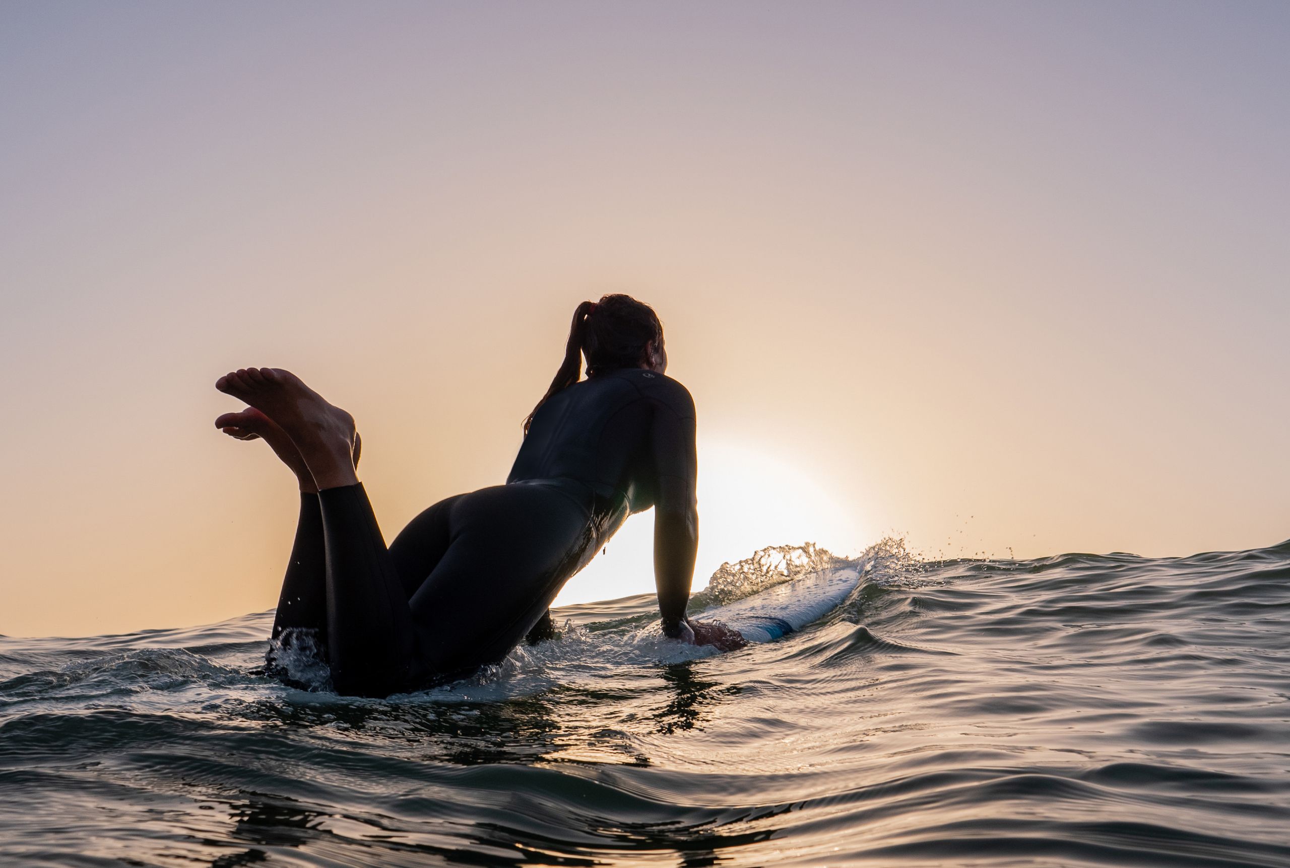 Olaian Loobook wetsuit desktop image full screen surfer girl