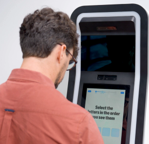 Person using kiosk.png
