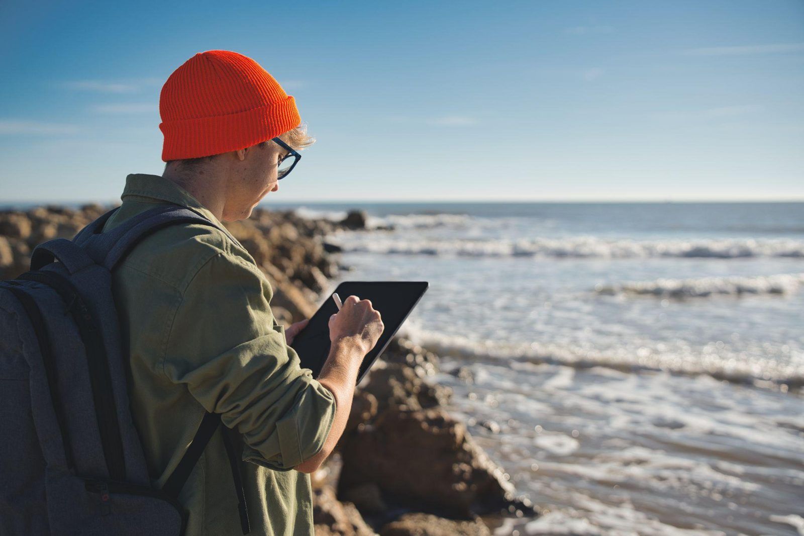 Field inspector reviewing information on a tablet