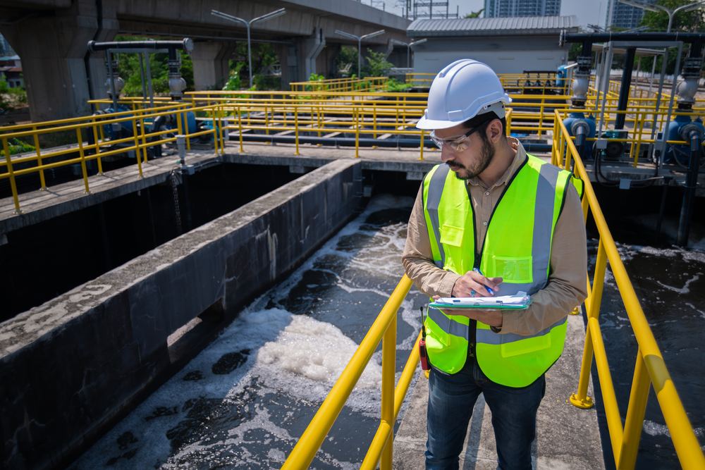 Public health professionals reviewing water treatment operations