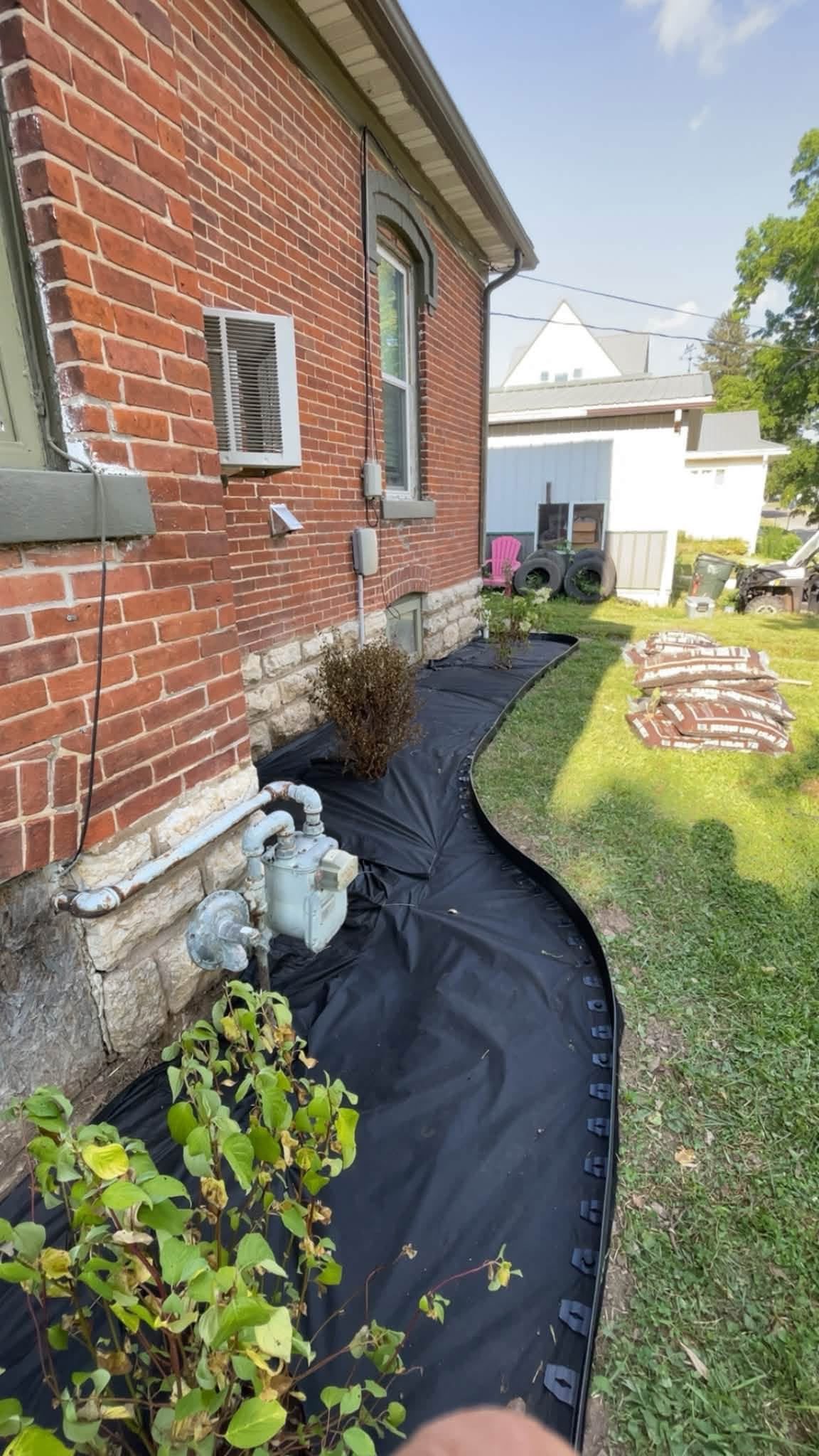 Landscape bed preparation and fabric installation