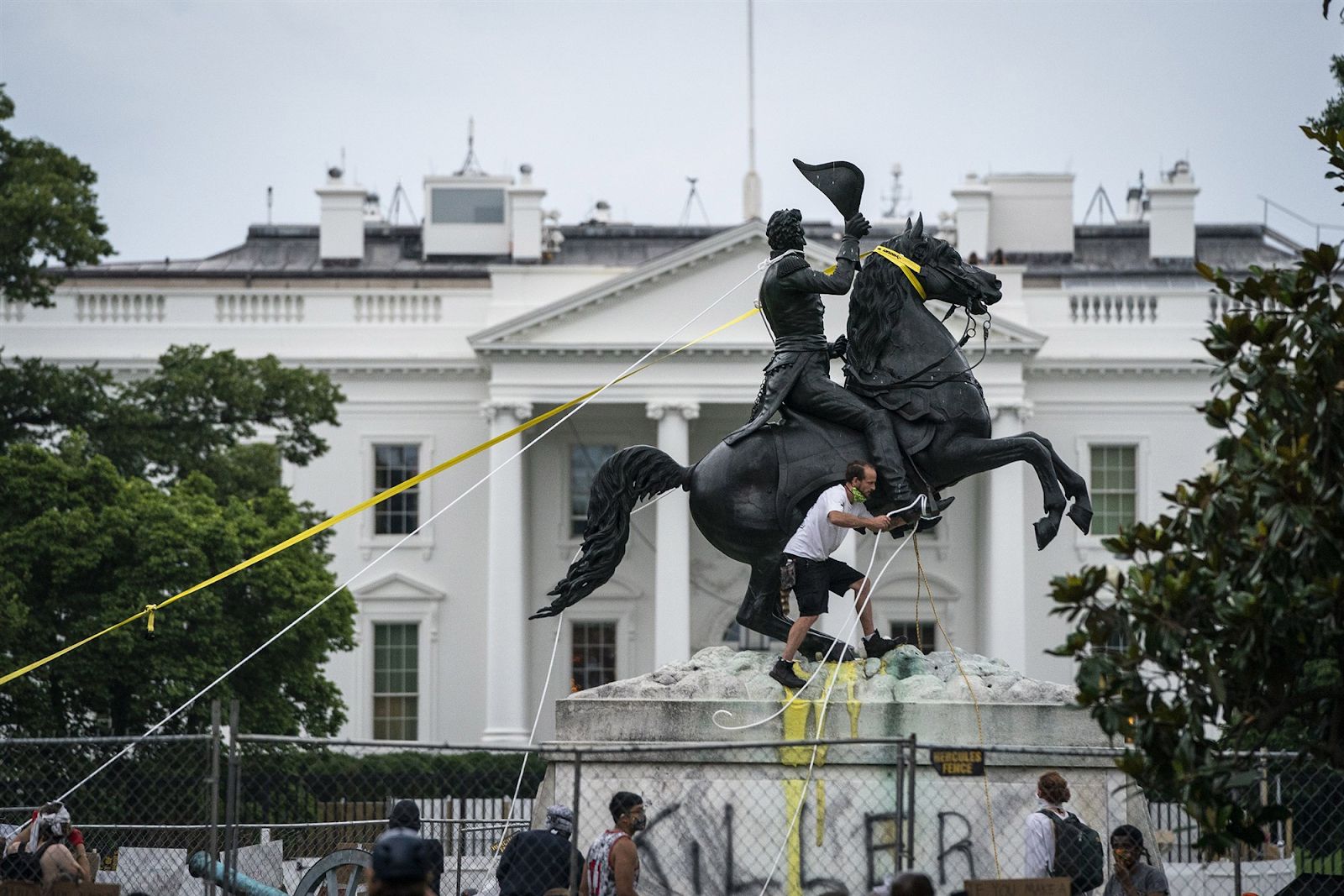 Protestors attempt to topple the statue of Andrew Jackson in Lafayette Square in June 2020. The statue still stands.