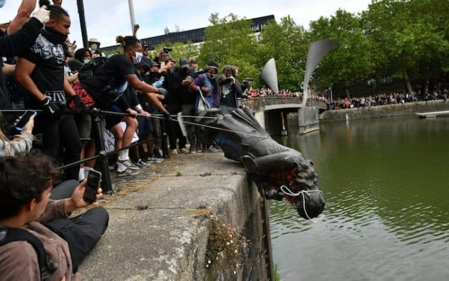 Protesters dump the statue of Edward Colston into a harbor