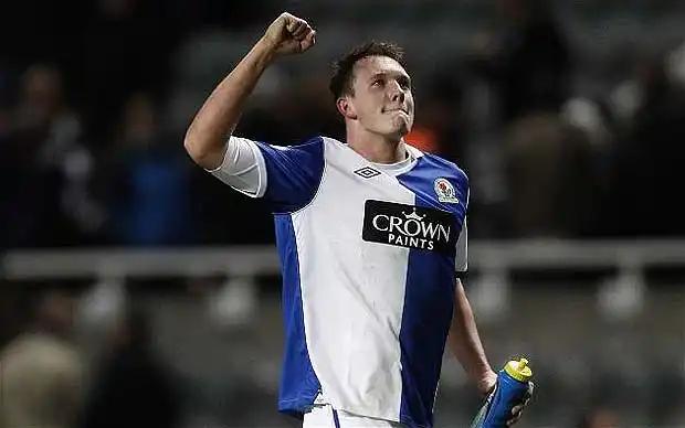 Phil Jones in a blue and white jersey