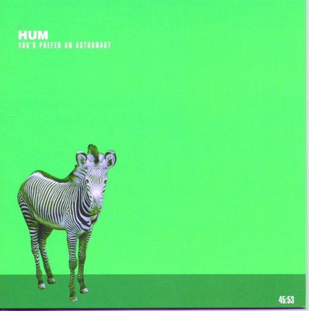 Album cover which has a green background and an animal