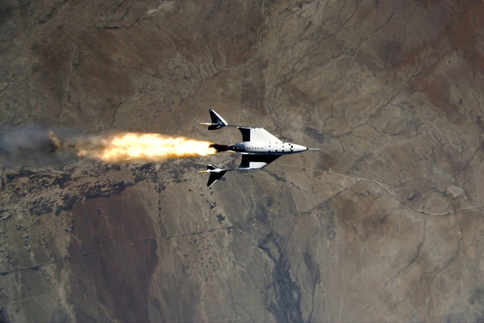 A Virgin Galactic SpaceShipTwo ignites its hybrid rocket motor