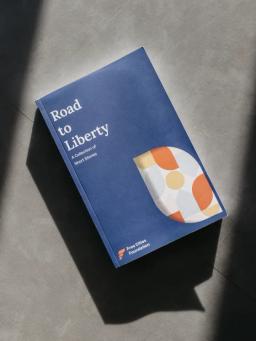 Cover of Road to Liberty, the Free Cities Foundation short story collection