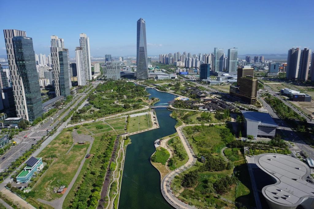 Aerial view of Songdo Central Park with its canal, green space and high-rises in South Korea