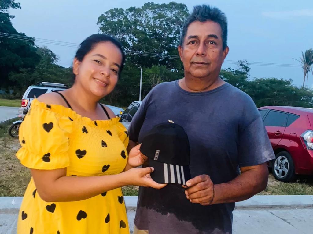 Helen Quintanilla and her father Luis, founders of Tienda Juliette, standing outdoors in Ciudad Morazán