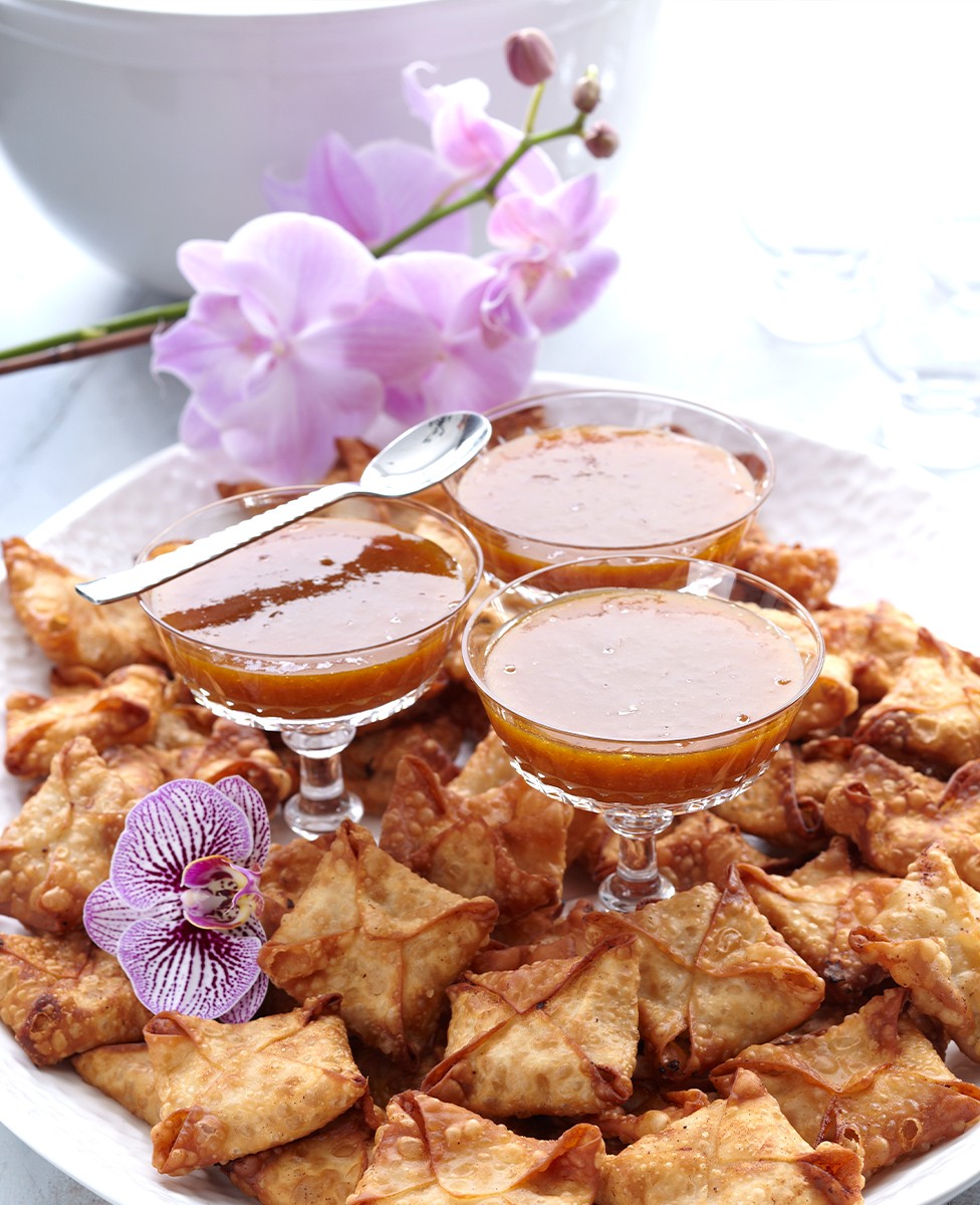 Wonton wrapped chicken with apricot dipping sauce