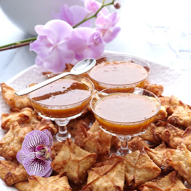 Wonton wrapped chicken with apricot dipping sauce