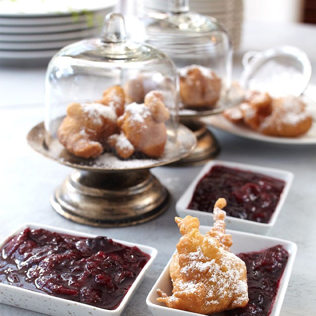 Beignets with berry coulis