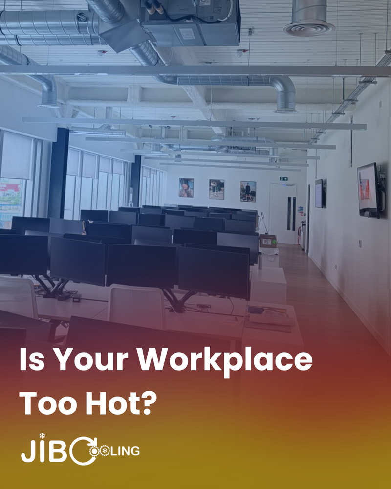 Open plan office with exposed ductwork and air conditioning, JIB Cooling blog cover
