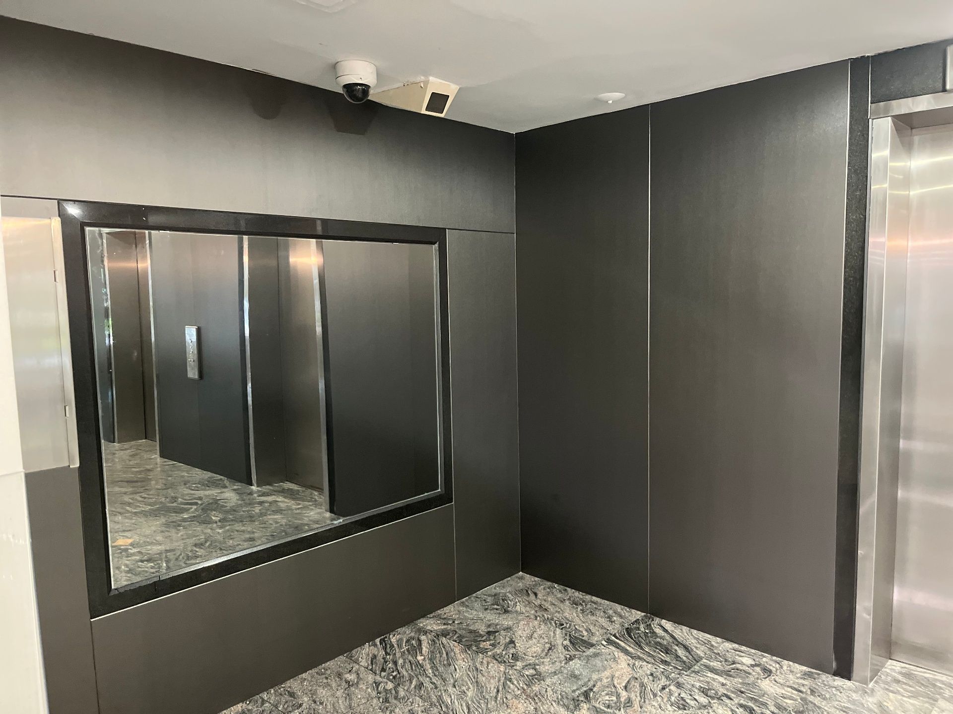 Feature wall vinyl wrap in a modern conference room