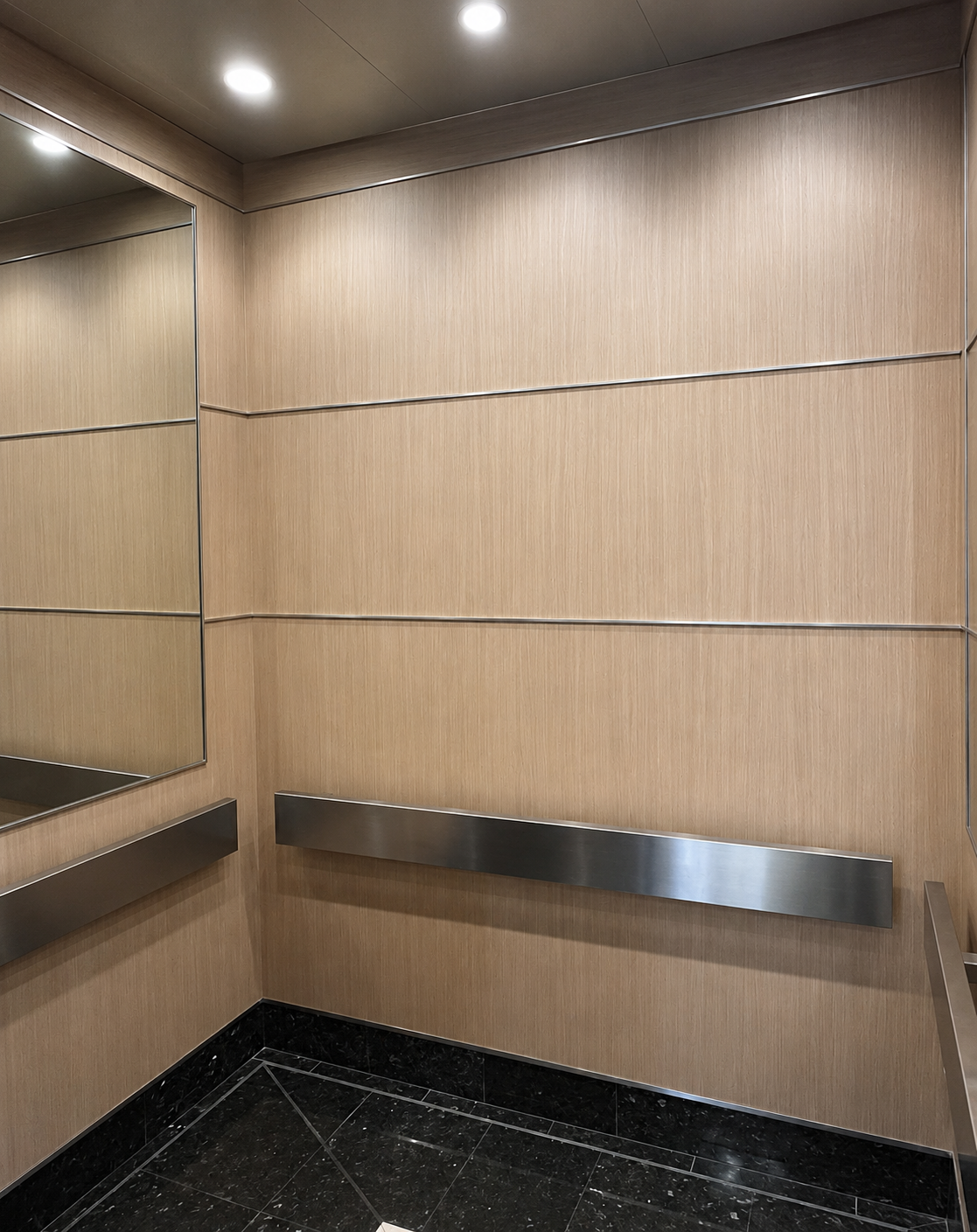 Elevator cab refinishing with wood-grain architectural vinyl wrap