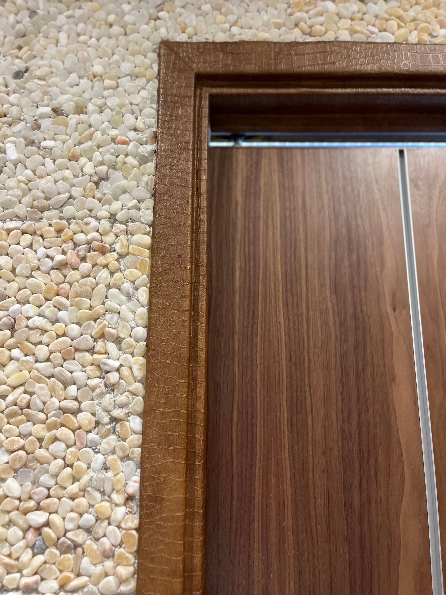 Close-up of vinyl-wrapped door frame millwork detail