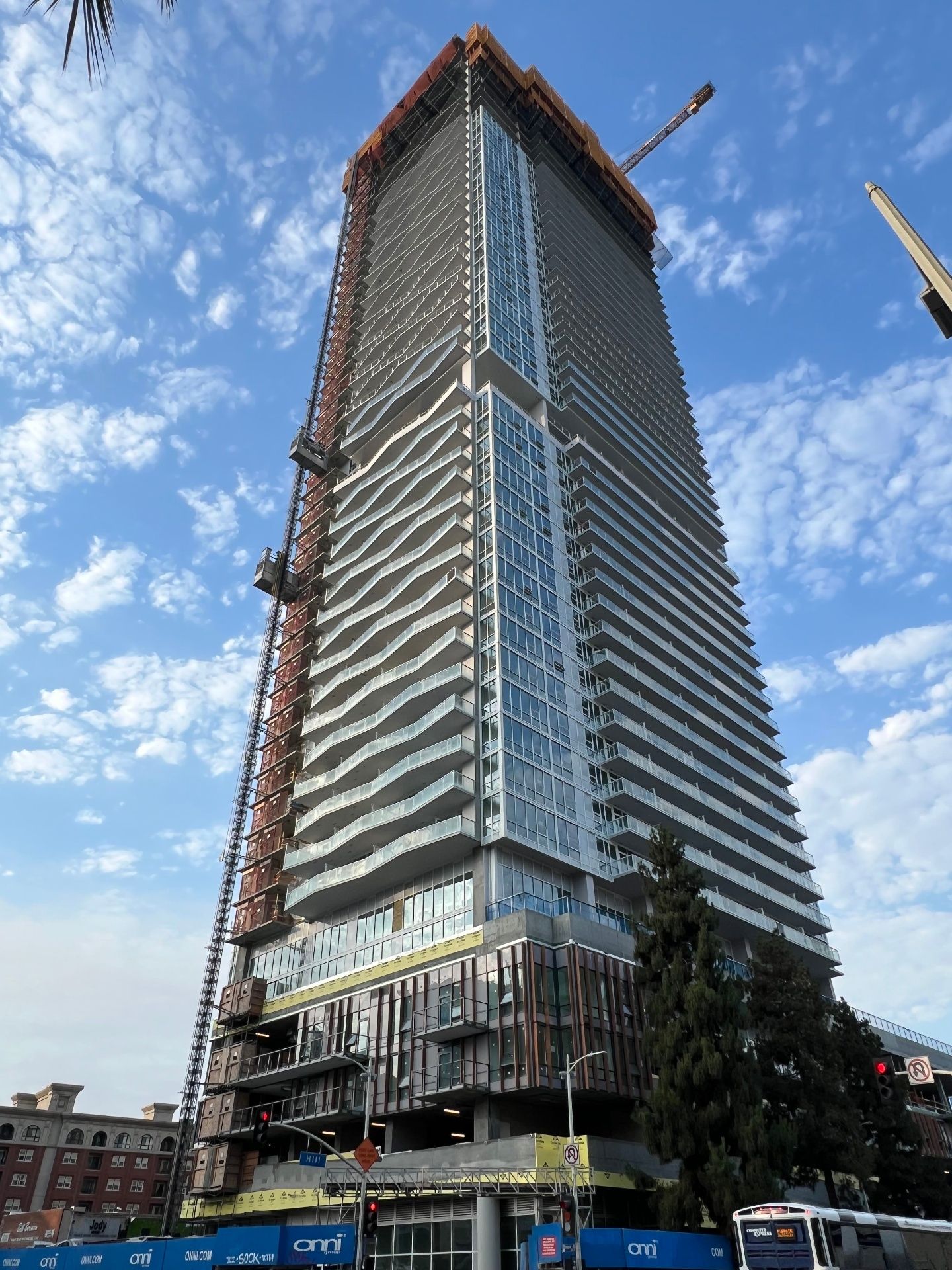 High-rise tower with architectural cladding under construction