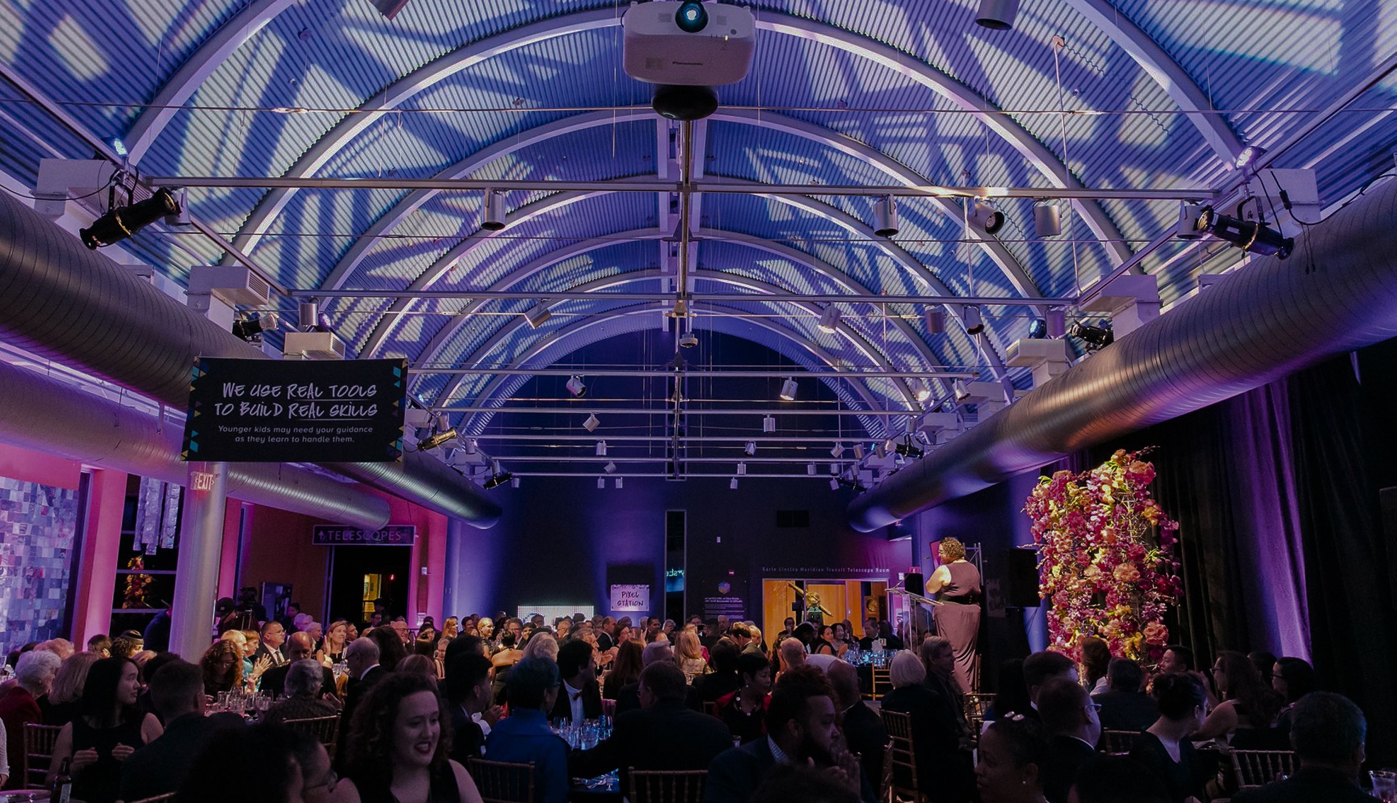 Guests gathered for a holiday celebration in an event venue