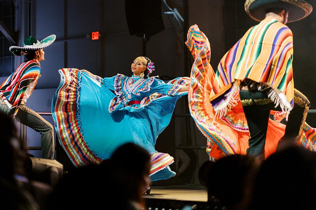 Folkloric dancers performing on stage