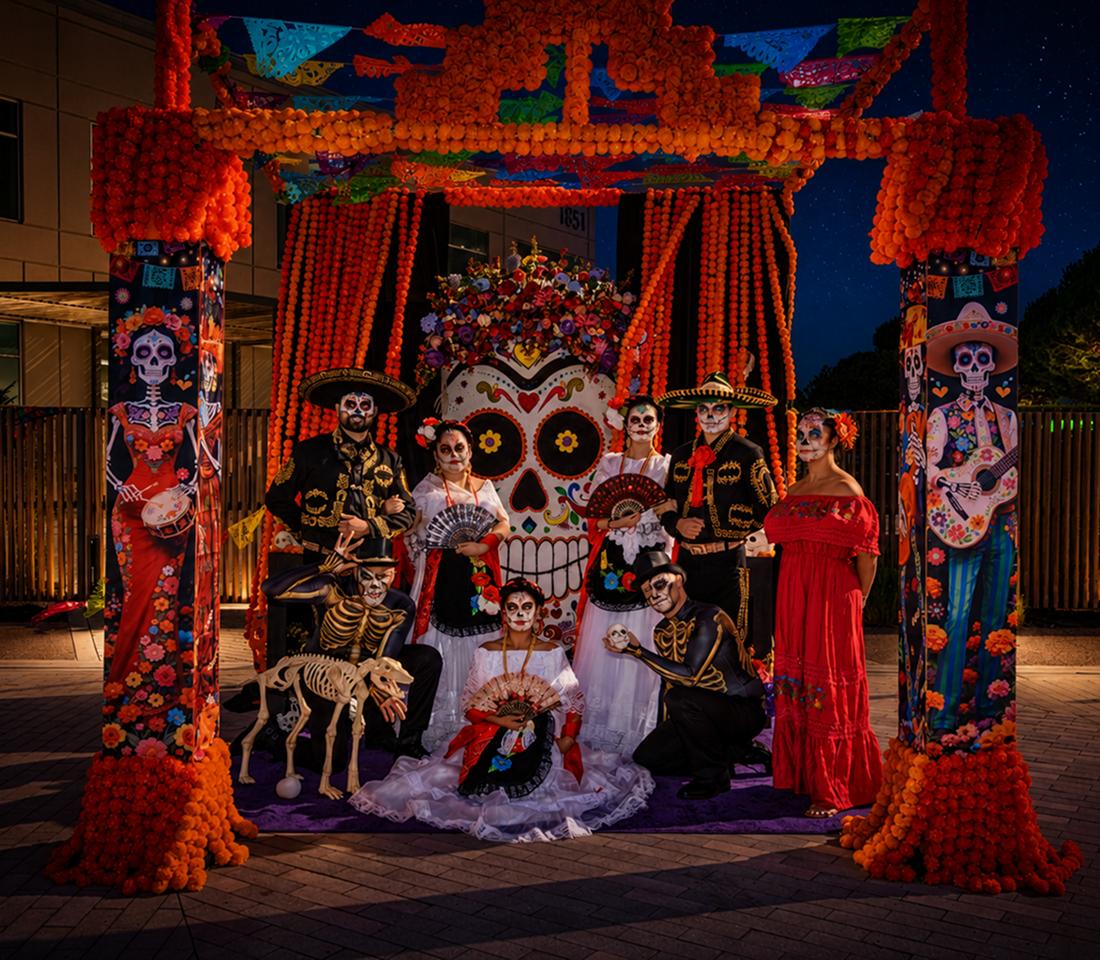 Day of the Dead themed event installation with performers