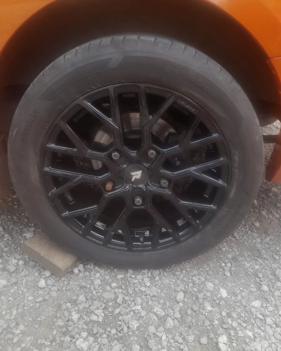 Orange hatchback, after: gloss black