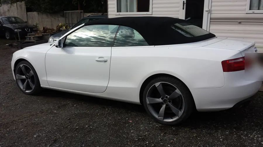 A white Audi A5 Cabriolet on gunmetal wheels