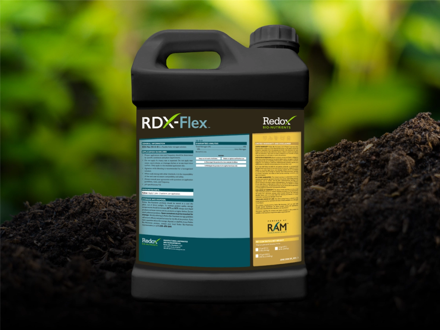 RDX-Flex jug on a mound of soil