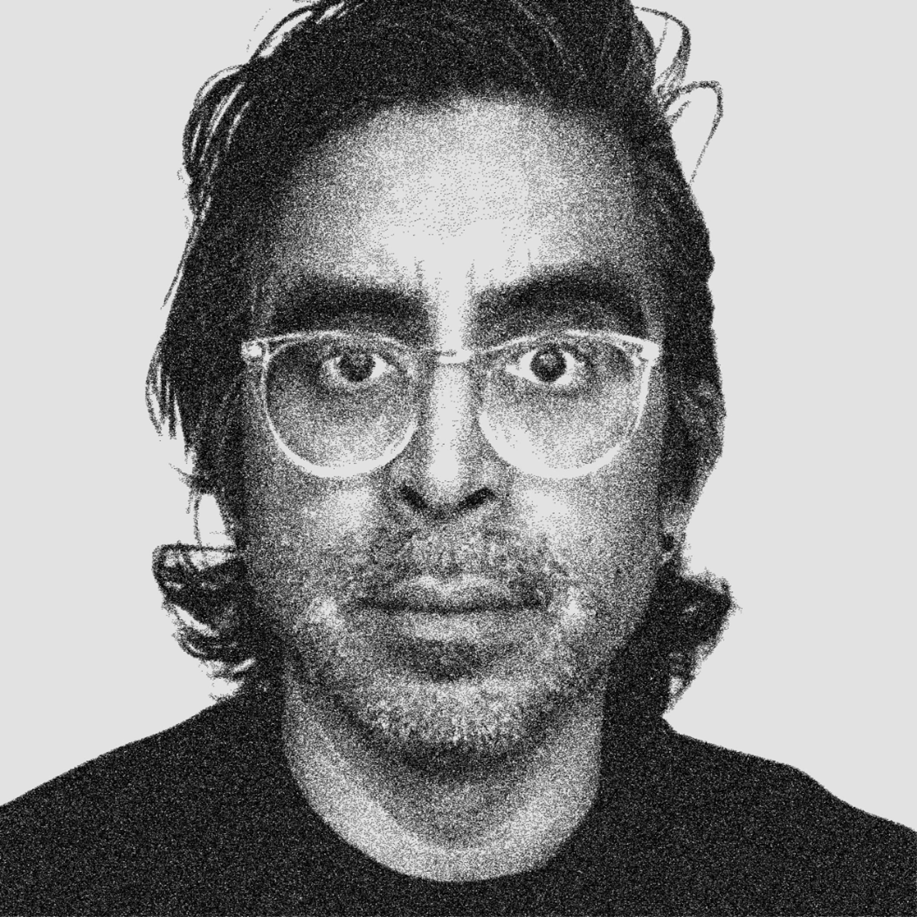 black and white headshot of Elliott Munoz