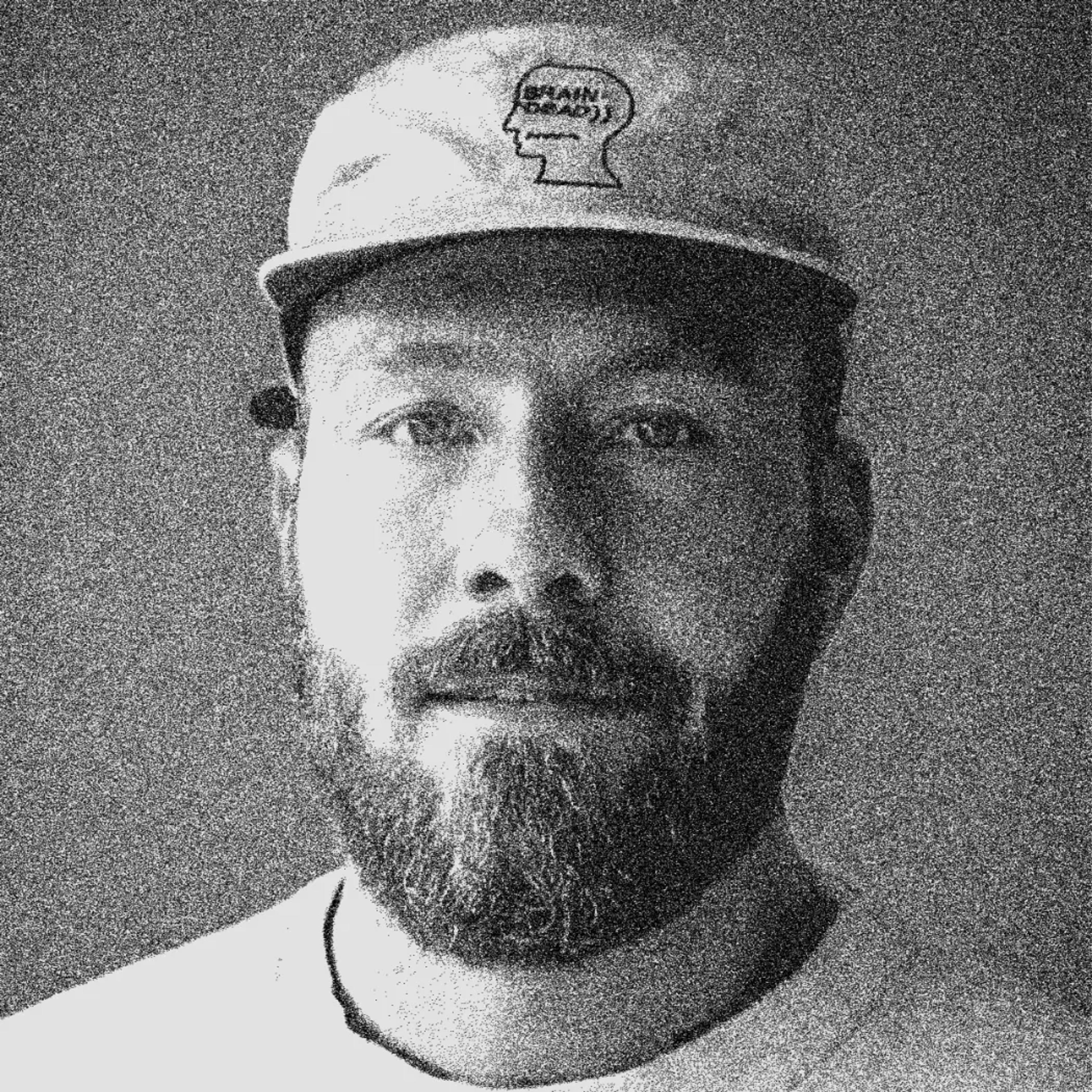 black and white headshot of Josh McKenna