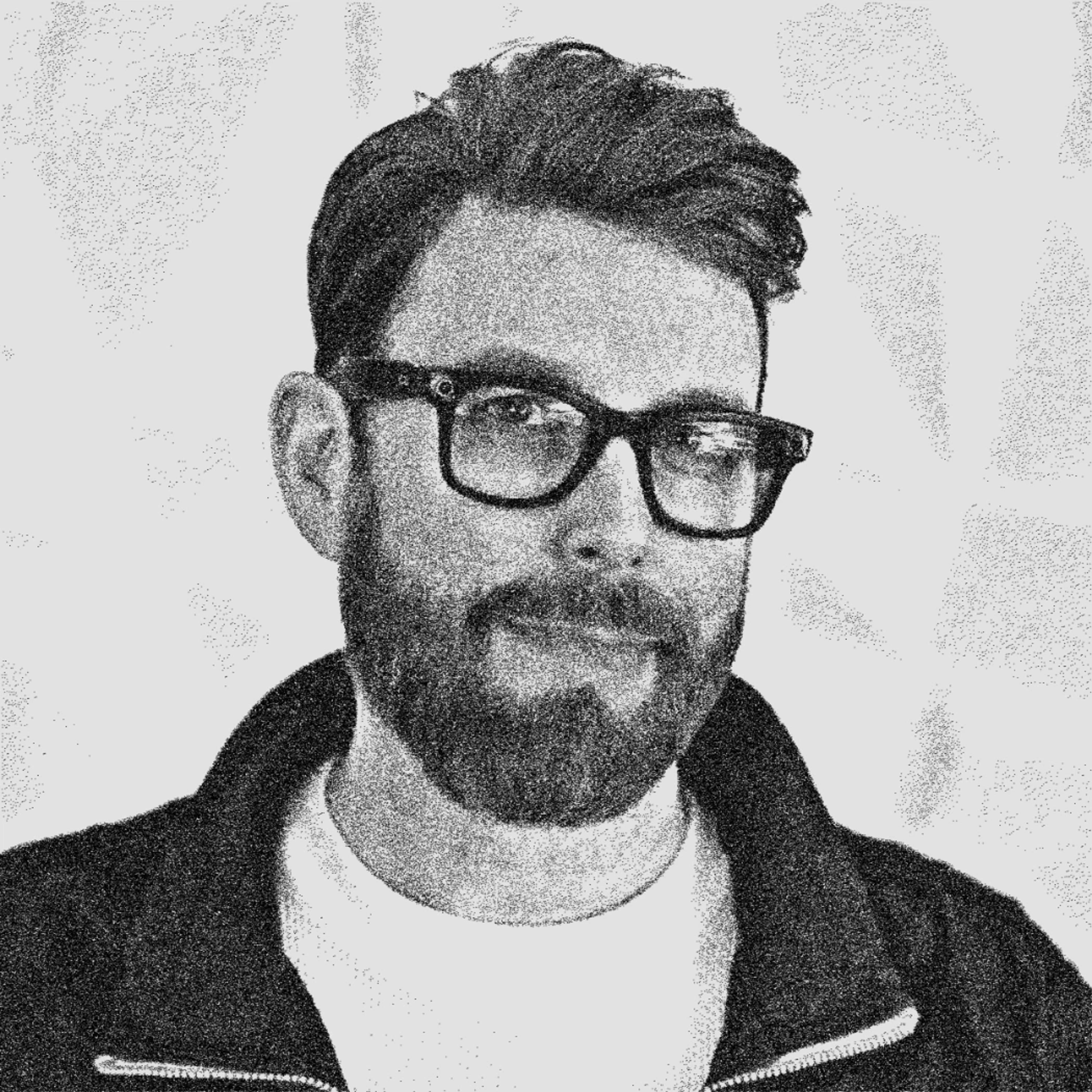 black and white headshot of Jayse Hansen
