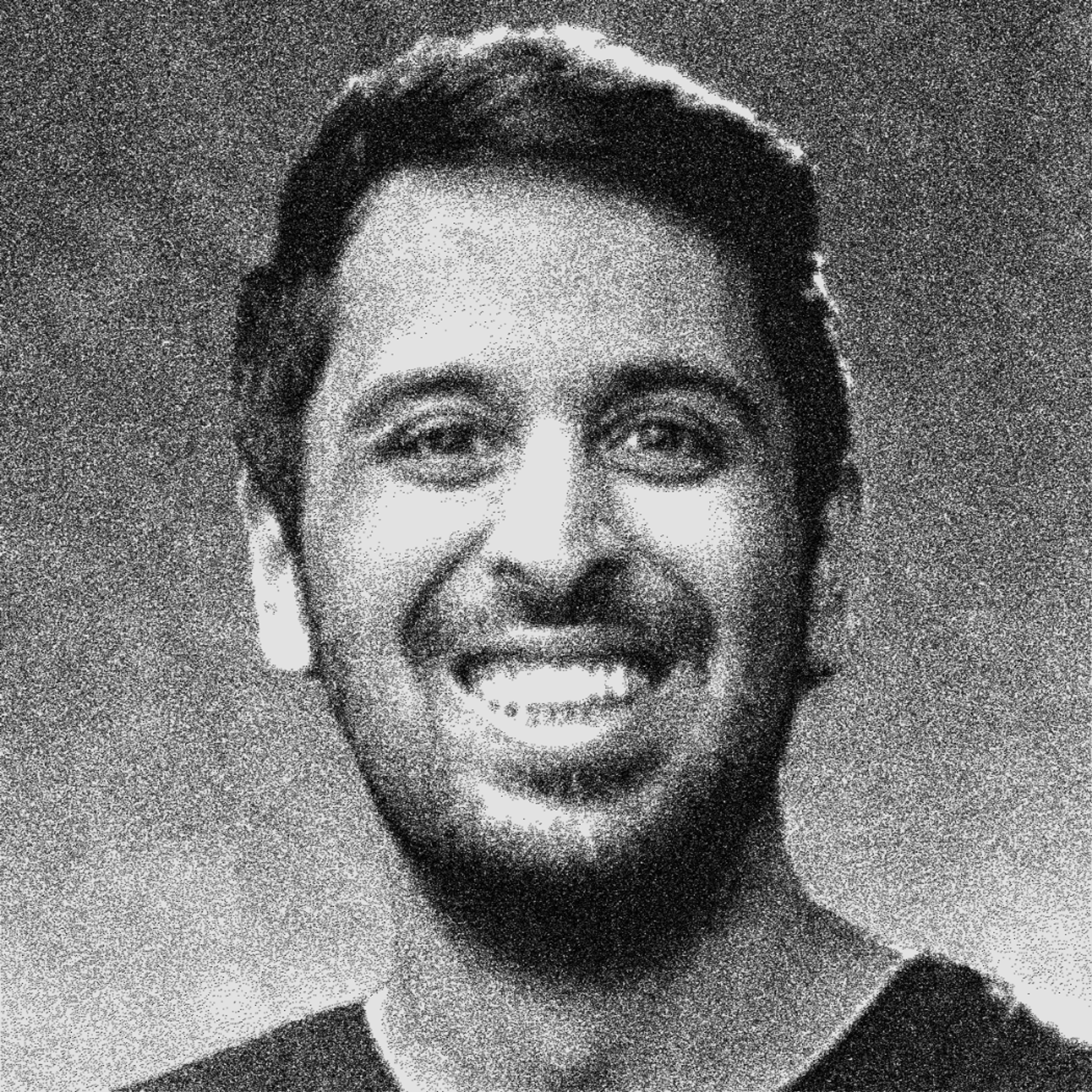 black and white headshot of Viral Shah