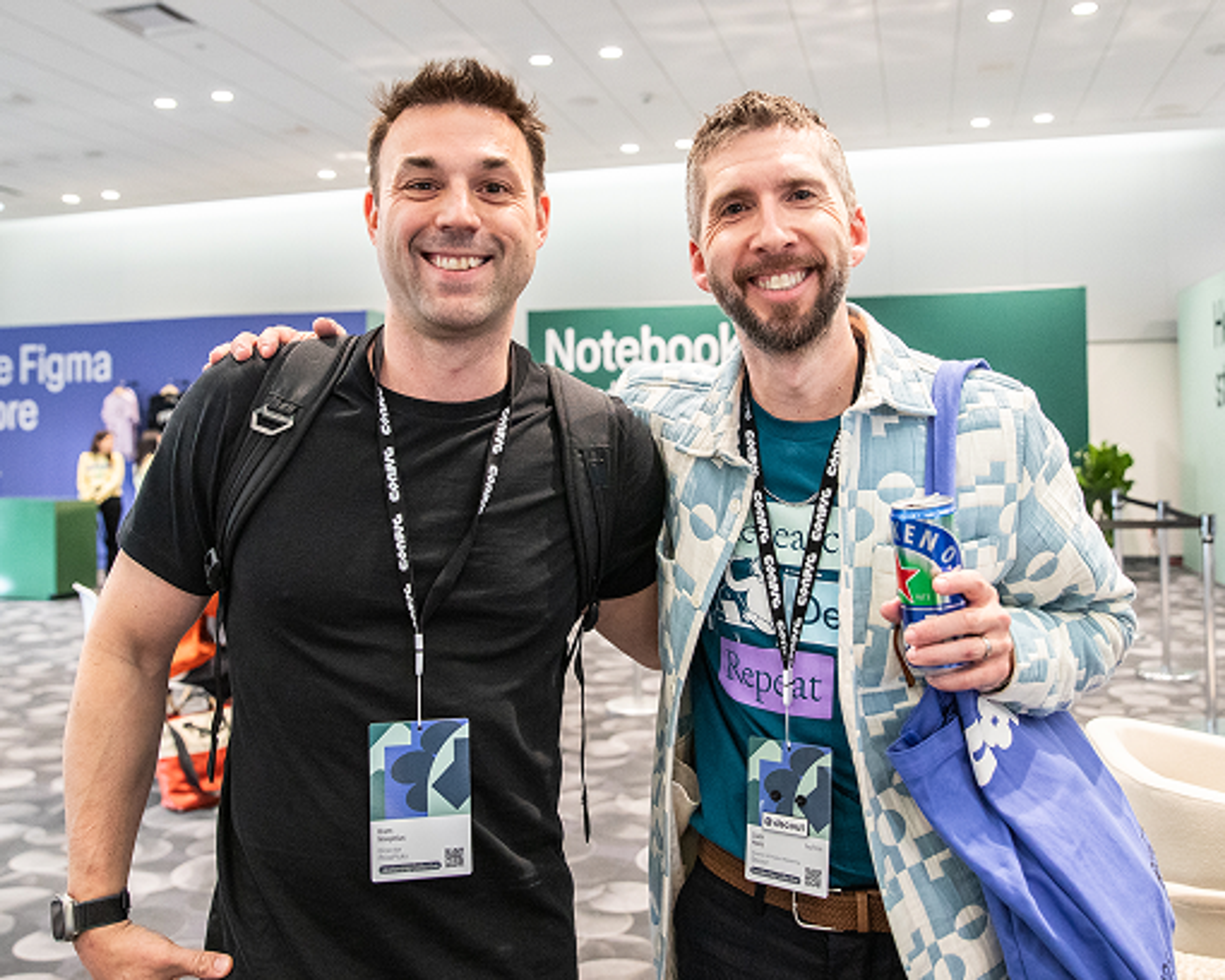 Two men smiling at Config