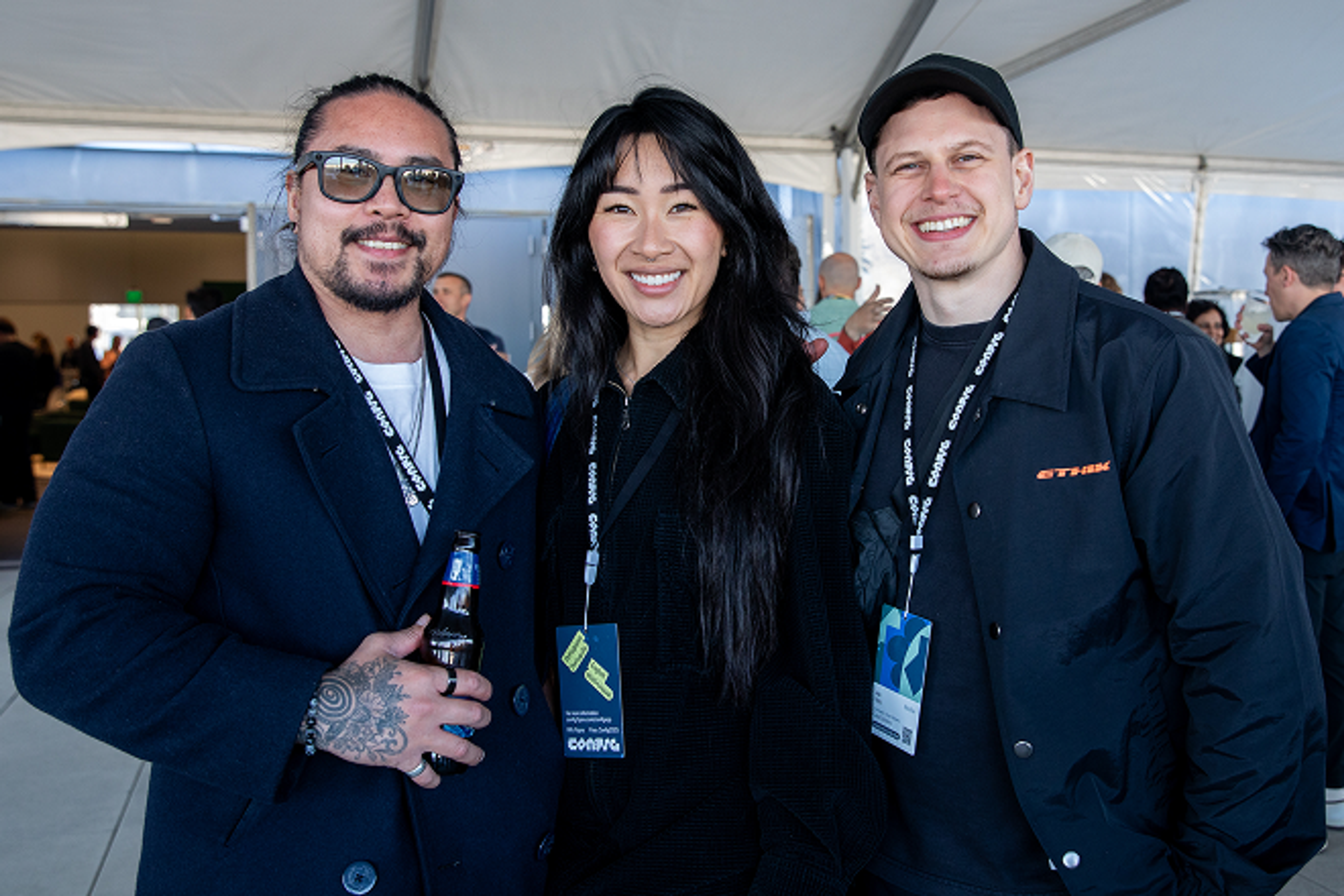 Three Config attendees smiling outside