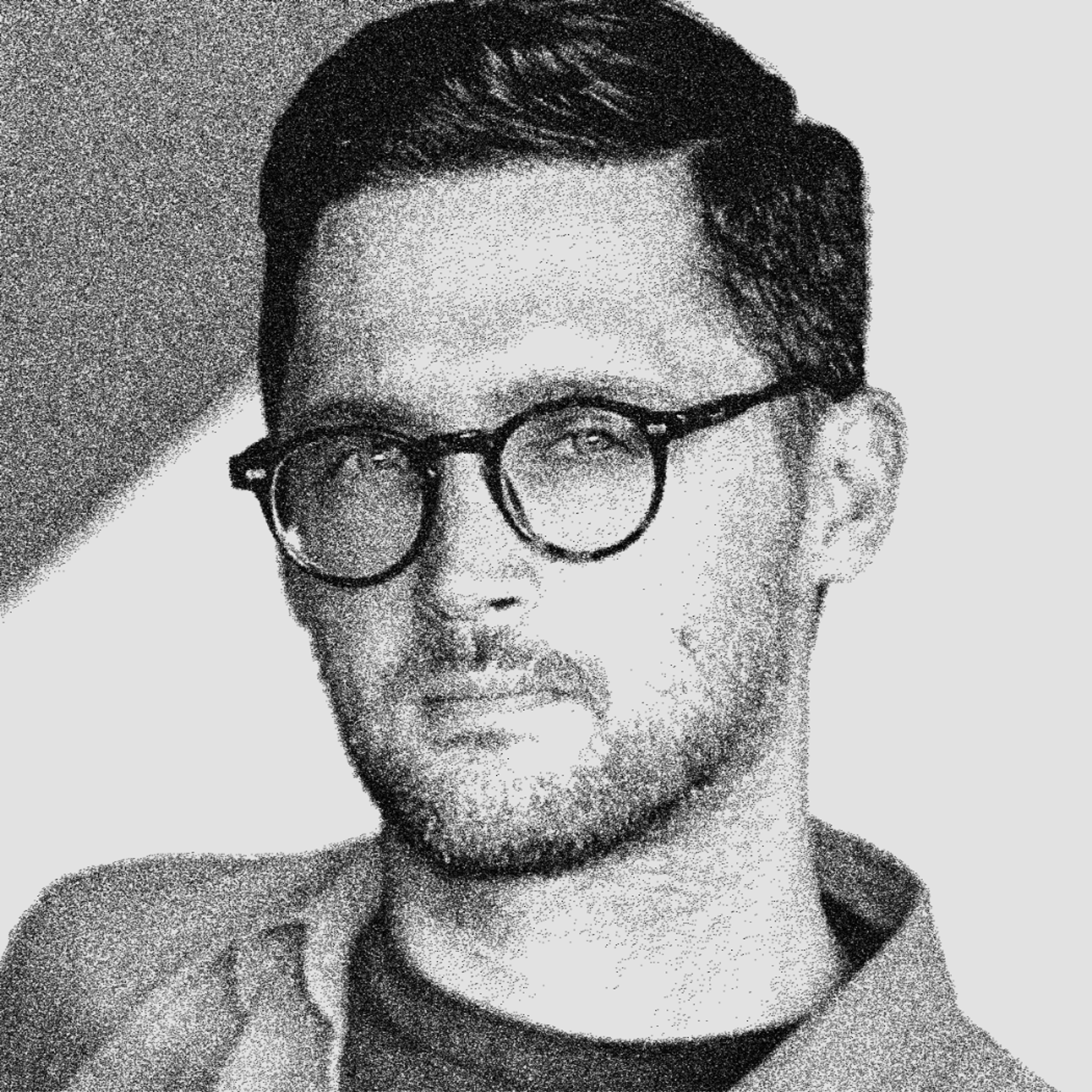 black and white headshot of Damien Correll