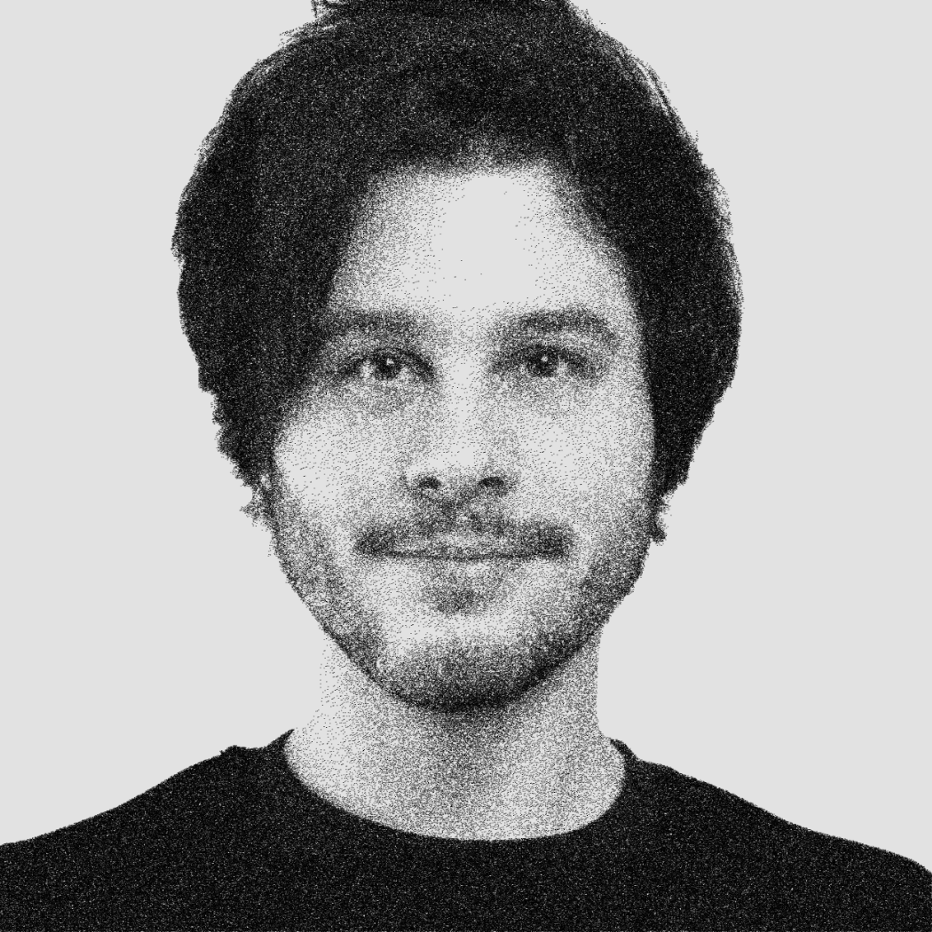 black and white headshot of Abdullah Alkhatib