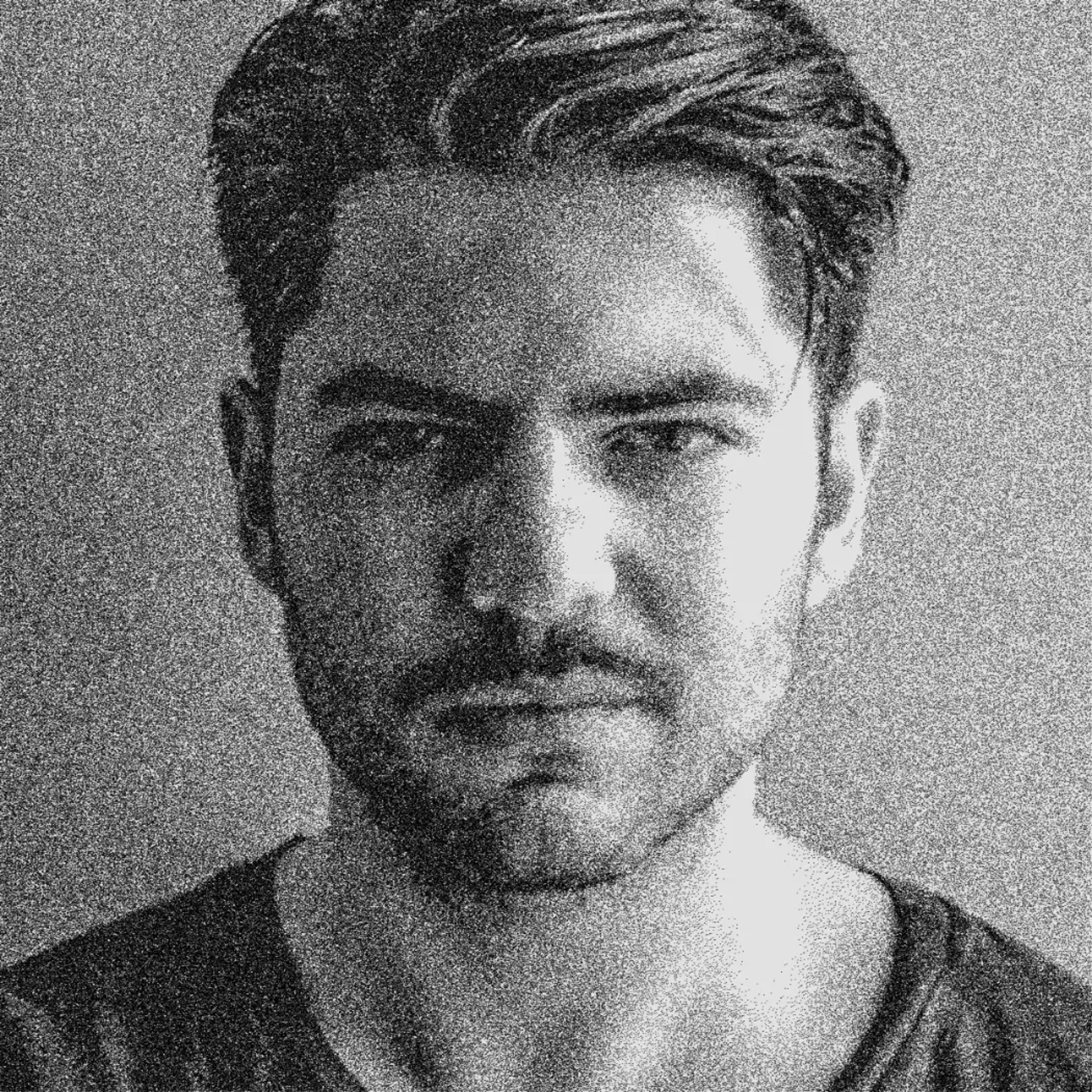 black and white headshot of Baytaş