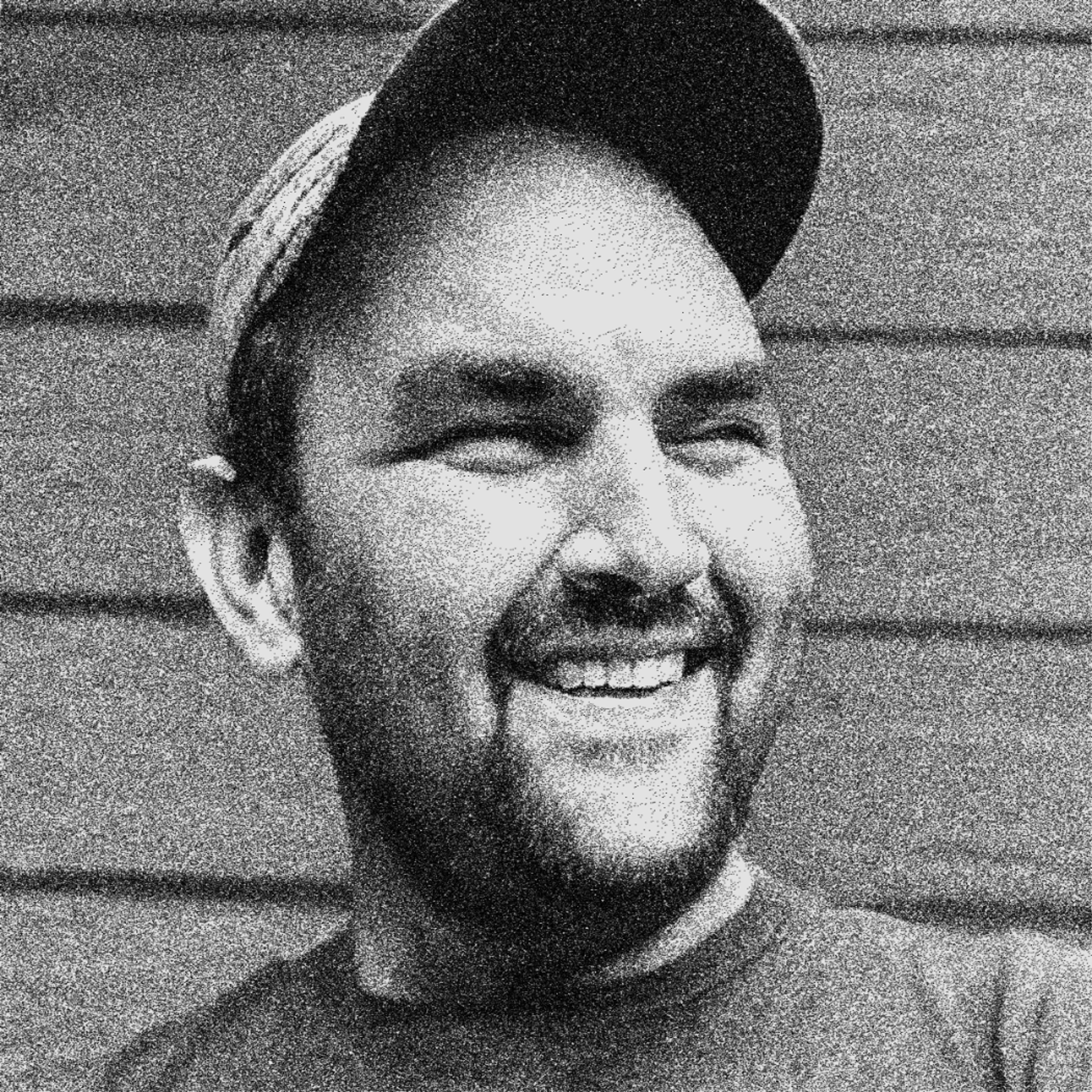 black and white headshot of Shane Johnston