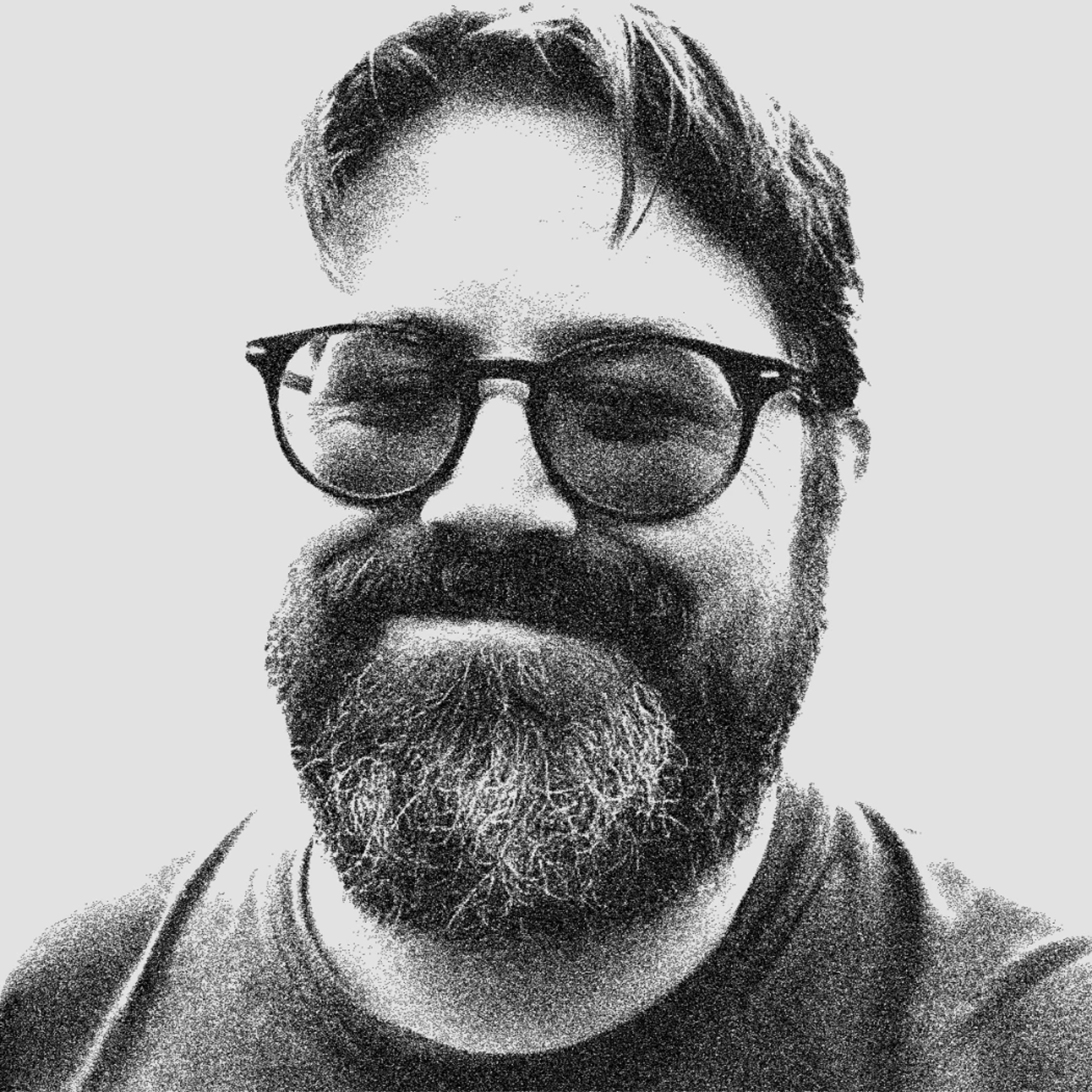 black and white headshot of Sam Thorne